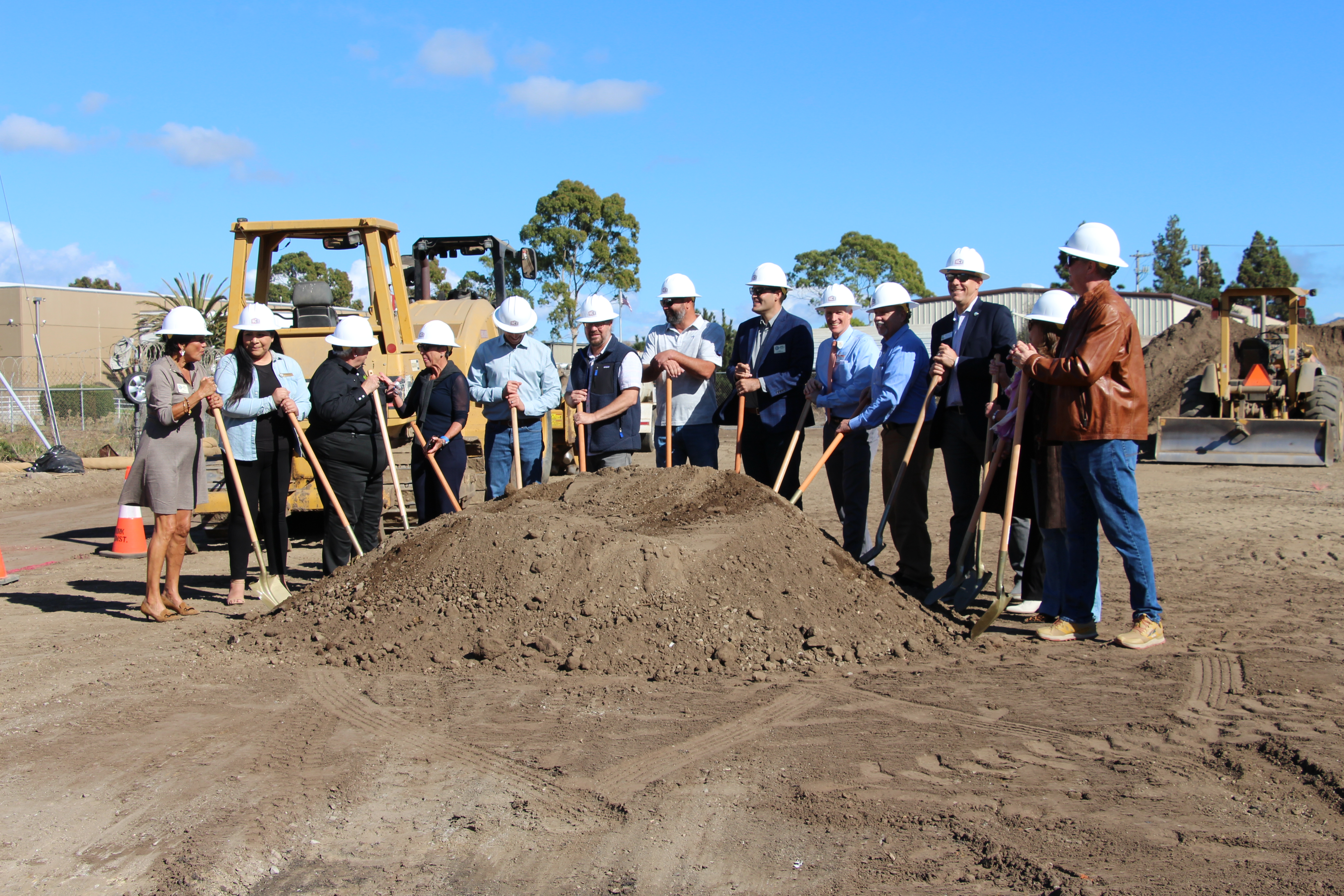 Imperative contributors to Balay Ko on Barca with shovels for ground breaking